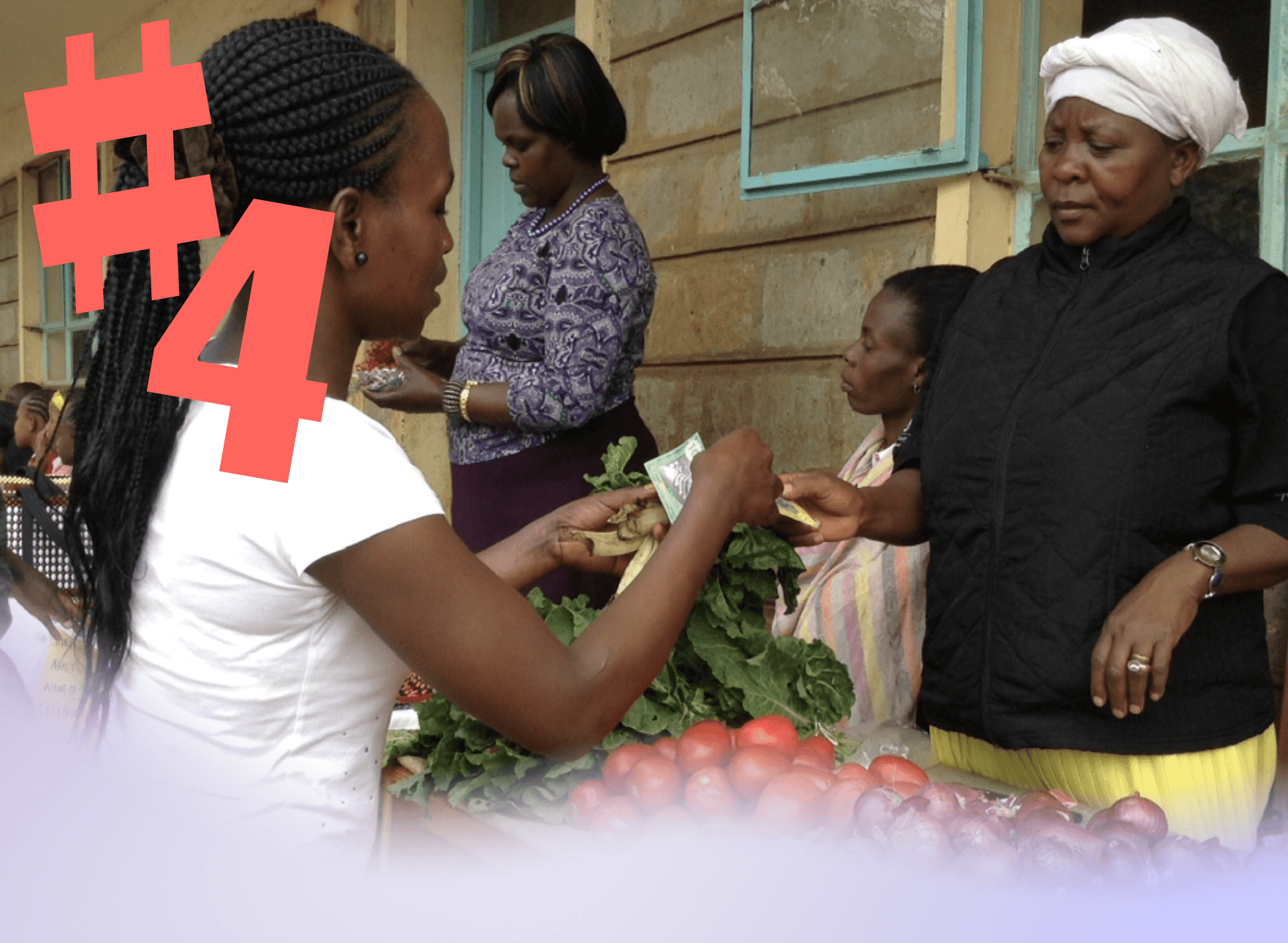 Woman paying another woman at a vegetable stall